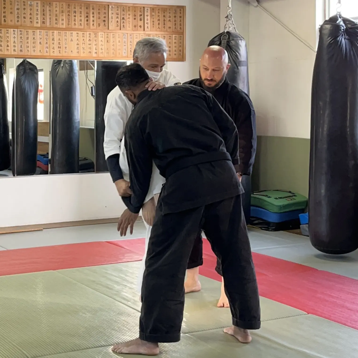 Olgun Tiltay learning hiza geri knee strike from Nobuya Tagami Sensei [9th Dan Tomarite Karate] in Ise Japan
